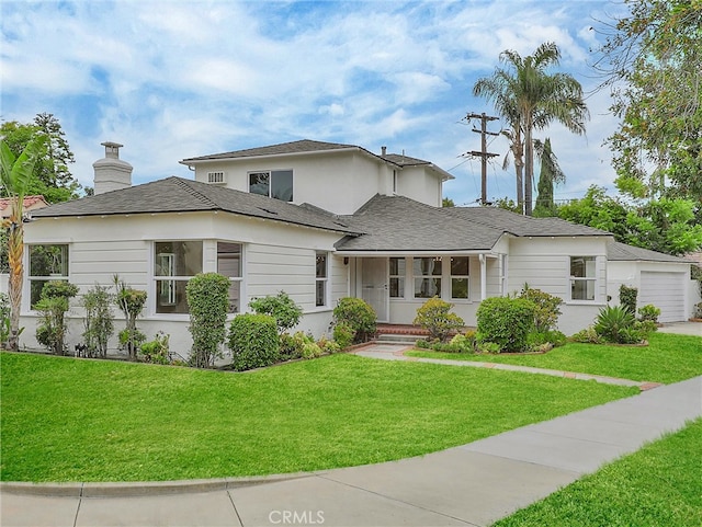 1017 Cordova Ave, Glendale, CA 91207 - view of front of property featuring a front yard, a chimney, a garage, and a shingled roof