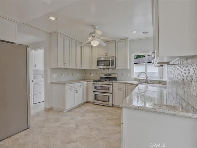 1017 Cordova Ave, Glendale, CA 91207 - kitchen with appliances with stainless steel finishes, washer / dryer, tasteful backsplash, light stone countertops, and a ceiling fan