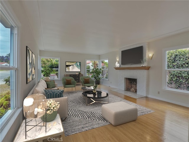 1017 Cordova Ave, Glendale, CA 91207 - living area with a brick fireplace and wood finished floors