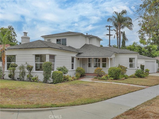 1017 Cordova Ave, Glendale, CA 91207 - view of front of home featuring a front lawn, a chimney, a garage, and roof with shingles