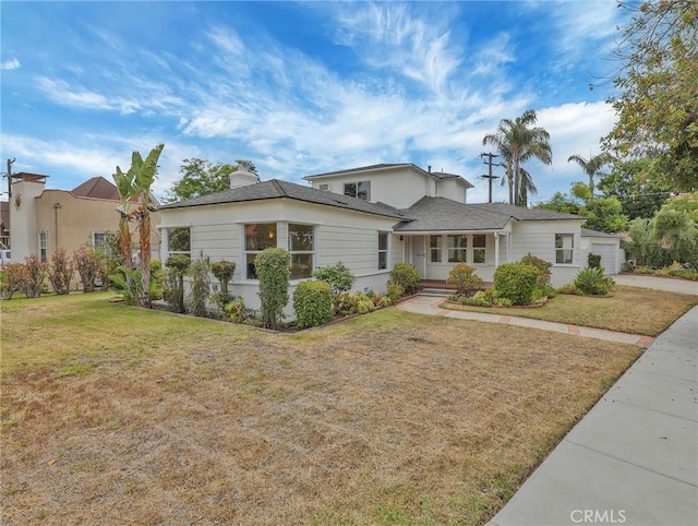 1017 Cordova Ave, Glendale, CA 91207 - traditional-style house featuring a front yard, driveway, and an attached garage