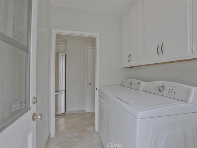 1017 Cordova Ave, Glendale, CA 91207 - laundry room with washer and dryer, cabinet space, and light tile patterned floors