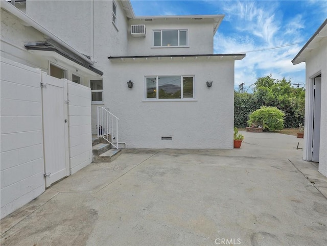 1017 Cordova Ave, Glendale, CA 91207 - back of property featuring a patio area, stucco siding, and an AC wall unit