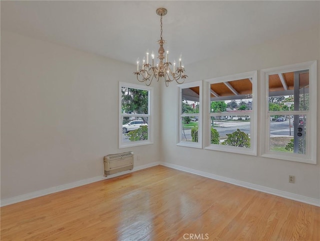 1017 Cordova Ave, Glendale, CA 91207 - spare room featuring a chandelier and wood finished floors