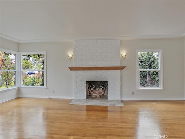 1017 Cordova Ave, Glendale, CA 91207 - unfurnished living room with wood finished floors and a fireplace