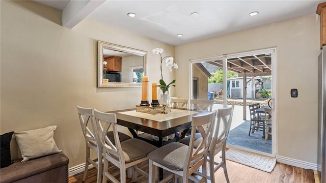 14658 Maclay St, San Fernando, CA 91345 - dining space featuring wood finished floors and recessed lighting