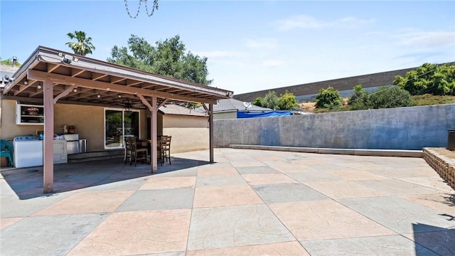 14658 Maclay St, San Fernando, CA 91345 - view of patio featuring separate washer and dryer and exterior kitchen