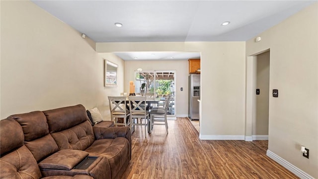 14658 Maclay St, San Fernando, CA 91345 - living area featuring wood finished floors and baseboards