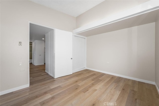 1661 Monterey Rd Unit 16G, Seal Beach, CA 90740 - unfurnished room featuring light wood-style floors and baseboards