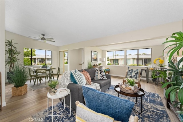 1661 Monterey Rd Unit 16G, Seal Beach, CA 90740 - living area featuring wood finished floors and ceiling fan