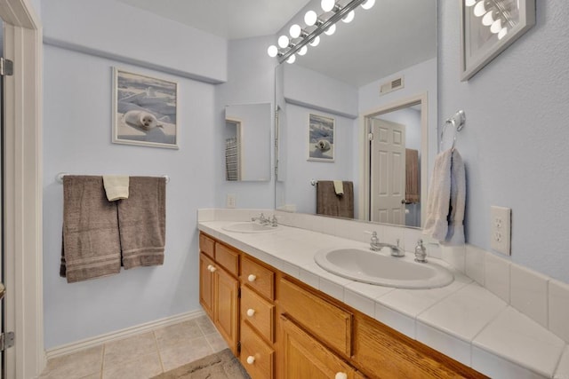 1159 Avenida Azul, San Marcos, CA 92069 - bathroom featuring double vanity and tile patterned flooring
