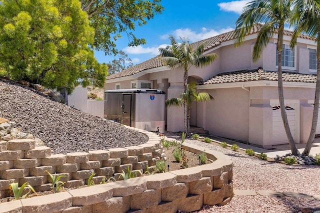 1159 Avenida Azul, San Marcos, CA 92069 - view of front of property with stucco siding, an attached garage, and a tile roof