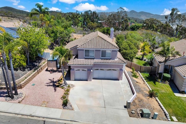 1159 Avenida Azul, San Marcos, CA 92069 - view of front of house featuring a tile roof, stucco siding, a chimney, a garage, and concrete driveway