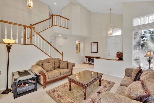 1159 Avenida Azul, San Marcos, CA 92069 - living room featuring stairway, a towering ceiling, and carpet floors