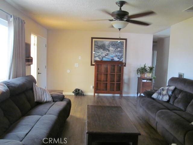 14537 Yucca St, Hesperia, CA 92345 - living area featuring ceiling fan and wood finished floors