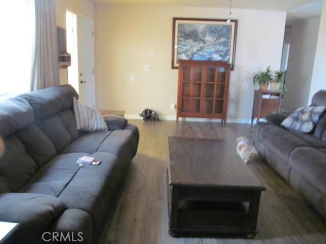14537 Yucca St, Hesperia, CA 92345 - living area with wood finished floors and baseboards