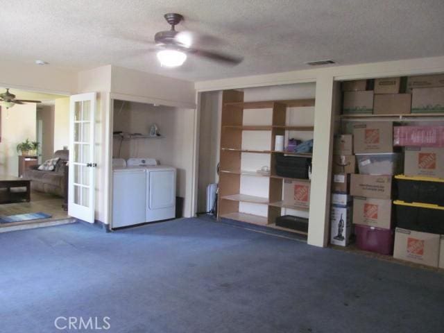 14537 Yucca St, Hesperia, CA 92345 - interior space featuring a ceiling fan, french doors, carpet, a textured ceiling, and independent washer and dryer