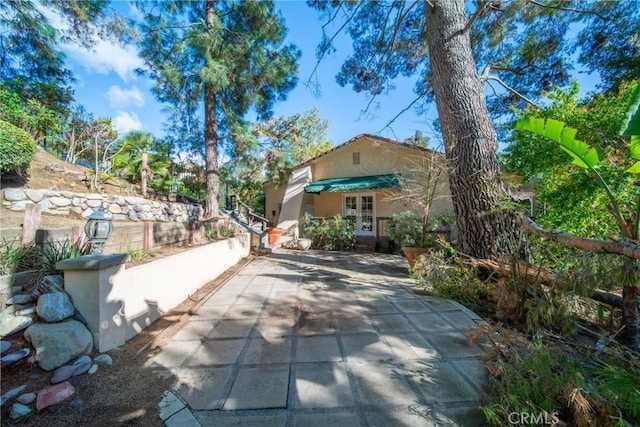 9472 Rembert Ln, Beverly Hills, CA 90210 - view of patio with french doors
