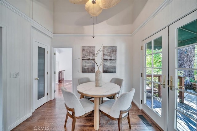 9472 Rembert Ln, Beverly Hills, CA 90210 - dining space with french doors, a towering ceiling, wood finished floors, and a ceiling fan
