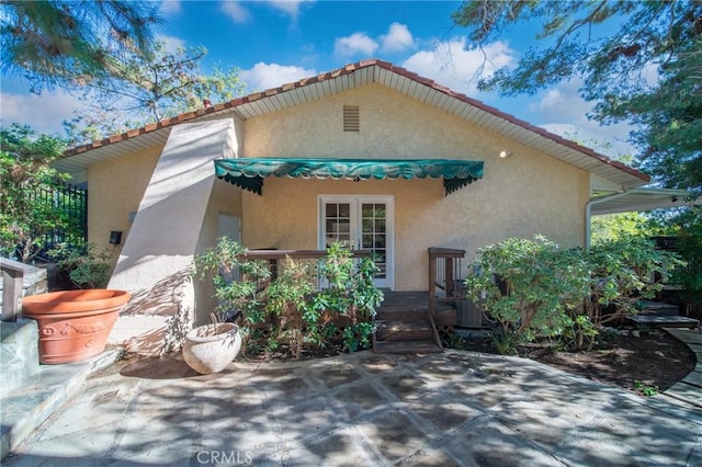 9472 Rembert Ln, Beverly Hills, CA 90210 - back of house featuring stucco siding