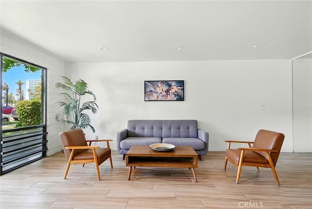 2121 E 1st St Unit 108, Long Beach, CA 90803 - living area with light wood finished floors and recessed lighting