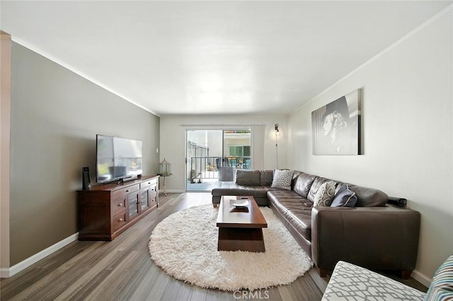 2121 E 1st St Unit 108, Long Beach, CA 90803 - living room with light wood finished floors and crown molding