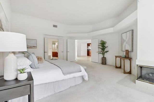 3309 Caminito Cabo Viejo, Del Mar, CA 92014 - carpeted bedroom with ensuite bathroom and a fireplace