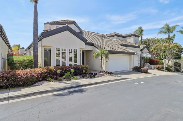 3309 Caminito Cabo Viejo, Del Mar, CA 92014 - view of front of property featuring stucco siding, a garage, and a tiled roof