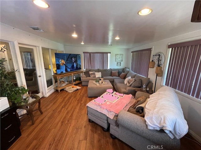 13431 Olympus Dr, Westminster, CA 92683 - living room featuring wood finished floors, french doors, and recessed lighting