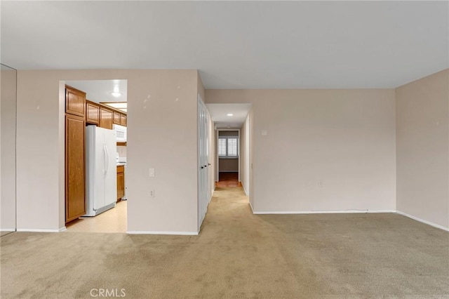3486 Bahia Blanca W Unit 3F, Laguna Woods, CA 92637 - empty room with light colored carpet and baseboards