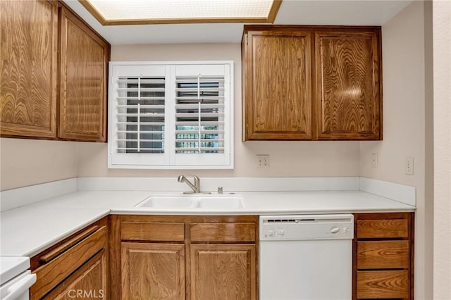 3486 Bahia Blanca W Unit 3F, Laguna Woods, CA 92637 - kitchen with dishwasher, brown cabinets, stove, and light countertops