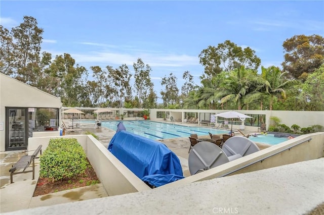 3486 Bahia Blanca W Unit 3F, Laguna Woods, CA 92637 - community pool with a patio area