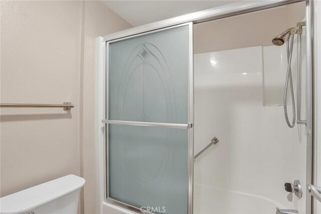 3486 Bahia Blanca W Unit 3F, Laguna Woods, CA 92637 - bathroom with toilet and enclosed tub / shower combo