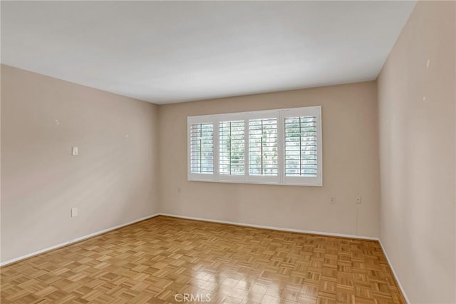 3486 Bahia Blanca W Unit 3F, Laguna Woods, CA 92637 - spare room featuring baseboards