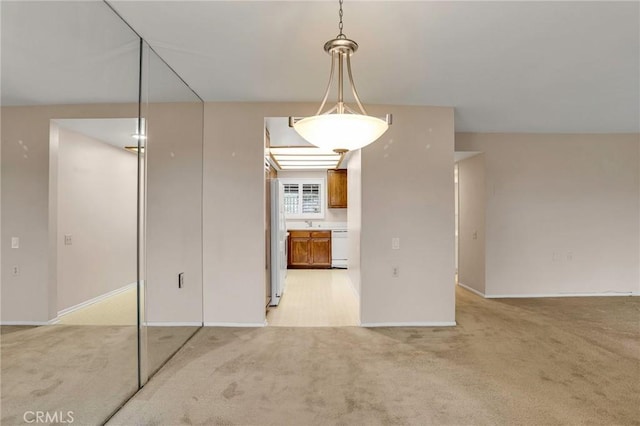 3486 Bahia Blanca W Unit 3F, Laguna Woods, CA 92637 - unfurnished room featuring light carpet and baseboards