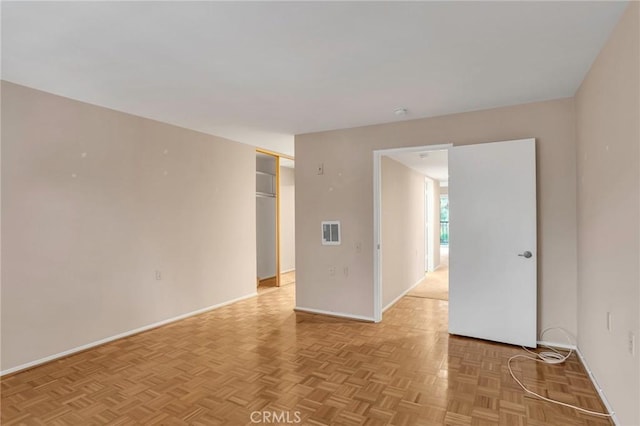 3486 Bahia Blanca W Unit 3F, Laguna Woods, CA 92637 - spare room featuring baseboards