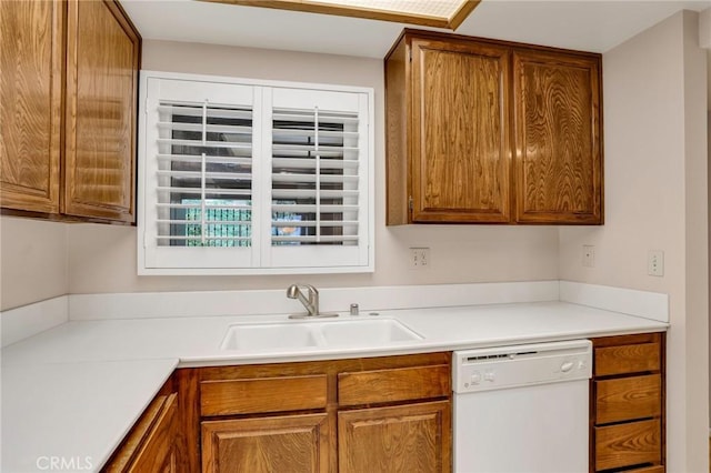 3486 Bahia Blanca W Unit 3F, Laguna Woods, CA 92637 - kitchen with dishwasher, brown cabinets, and light countertops