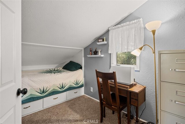 24825 Florence Ave, Corning, CA 96021 - bedroom with vaulted ceiling, carpet flooring, and a textured wall