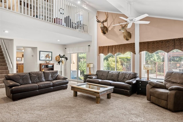 24825 Florence Ave, Corning, CA 96021 - living area with carpet flooring, high vaulted ceiling, a ceiling fan, and stairs