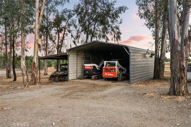 24825 Florence Ave, Corning, CA 96021 - outdoor structure at dusk featuring a carport