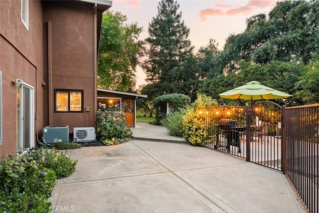 24825 Florence Ave, Corning, CA 96021 - patio terrace at dusk featuring a patio area