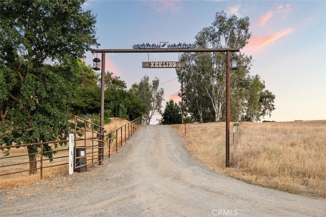 24825 Florence Ave, Corning, CA 96021 - view of dirt / gravel driveway with a rural view