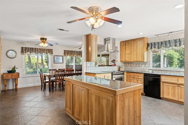 24825 Florence Ave, Corning, CA 96021 - kitchen featuring wall chimney range hood, dishwasher, stainless steel electric stove, ceiling fan, and plenty of natural light