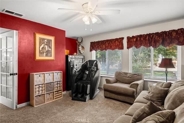 24825 Florence Ave, Corning, CA 96021 - carpeted living room featuring a ceiling fan and baseboards