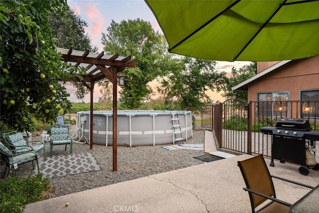 24825 Florence Ave, Corning, CA 96021 - patio terrace at dusk with area for grilling and a pergola