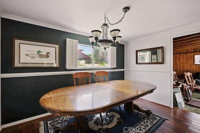 665 N Waterbury Ave, Covina, CA 91722 - dining room featuring a chandelier, wood-type flooring, and ornamental molding