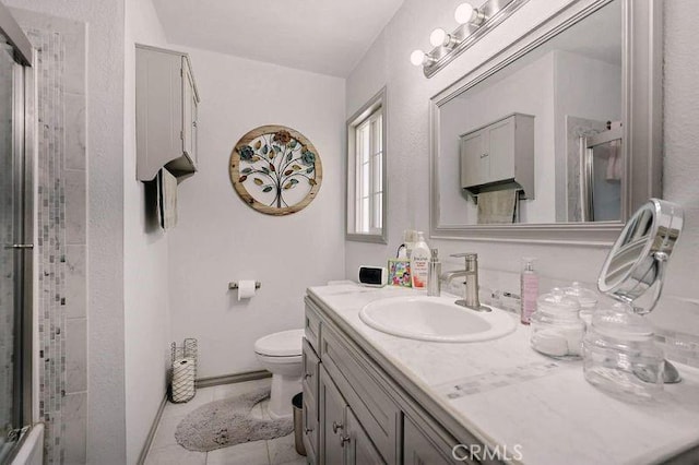 665 N Waterbury Ave, Covina, CA 91722 - bathroom featuring an enclosed shower, vanity, and tile patterned flooring