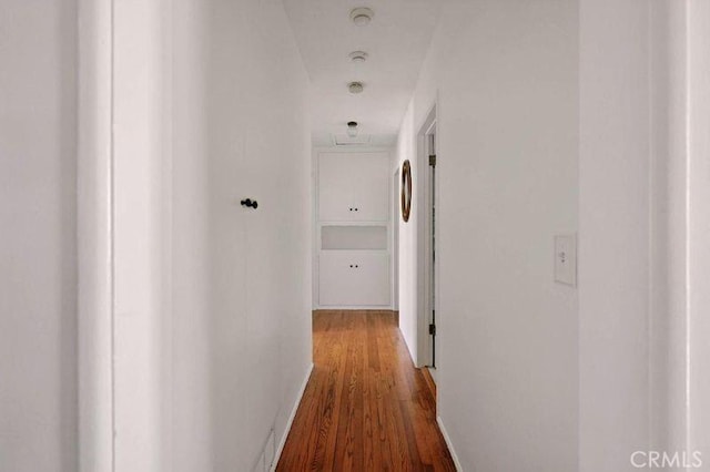 665 N Waterbury Ave, Covina, CA 91722 - corridor featuring wood finished floors and baseboards