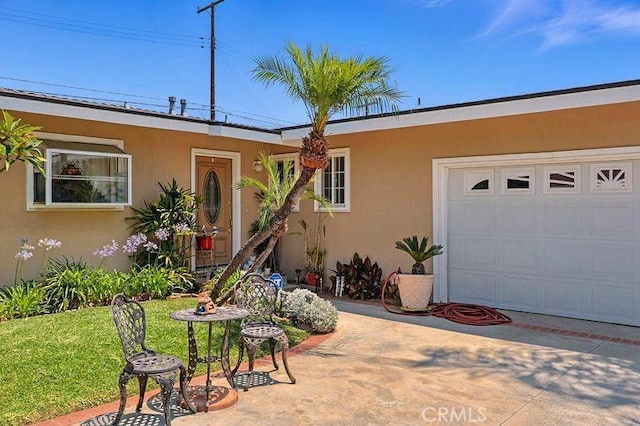 665 N Waterbury Ave, Covina, CA 91722 - view of front of house with stucco siding, a garage, and a front yard