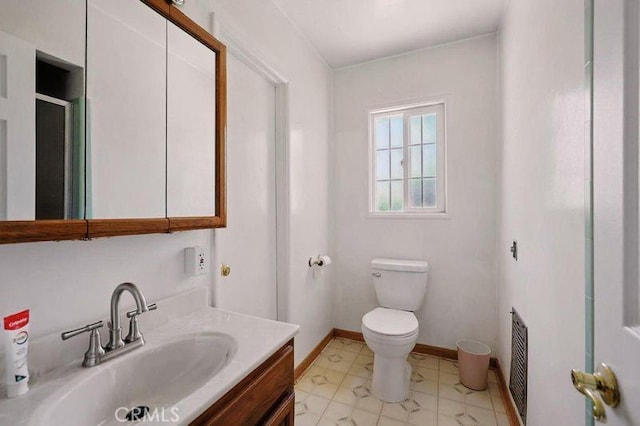 665 N Waterbury Ave, Covina, CA 91722 - full bathroom featuring vanity, a shower with door, heating unit, and marble look tiles